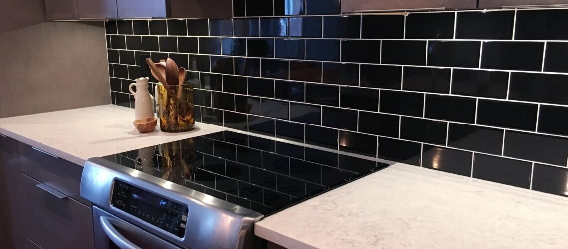 Kitchen backsplash in black subway tiles